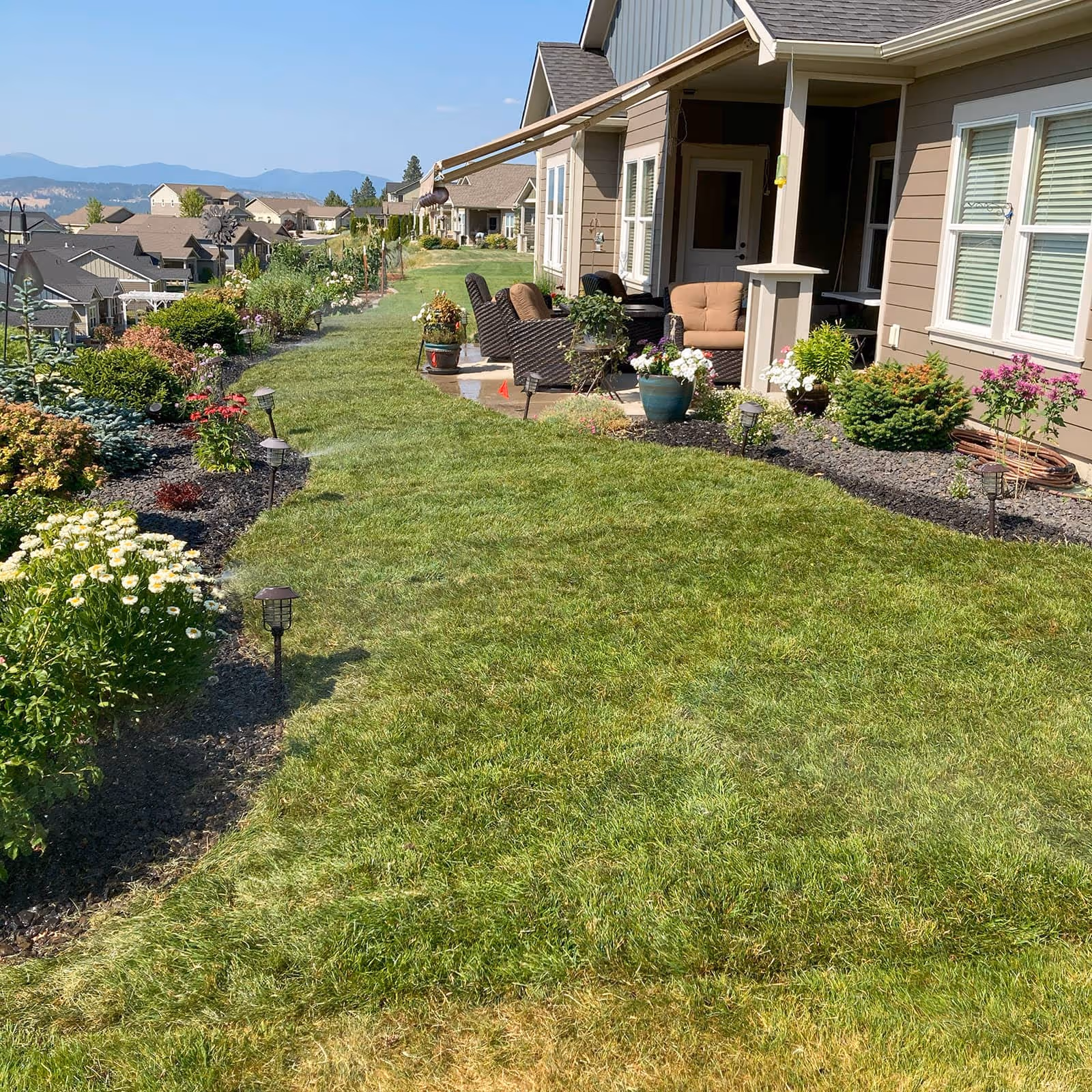 Lawn mowing service in Spokane Valley front yard